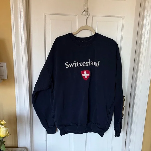 Brandy Melville Navy Crewneck with White 'Switzerland' Text and Red Crest - Picture 1 of 2